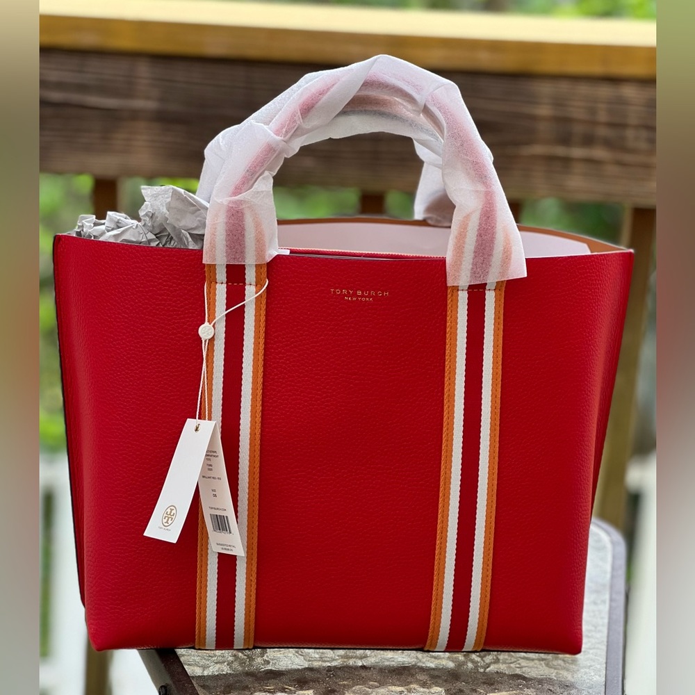 Brilliant Red Tory Burch tote. Never used with original tags and dustbag